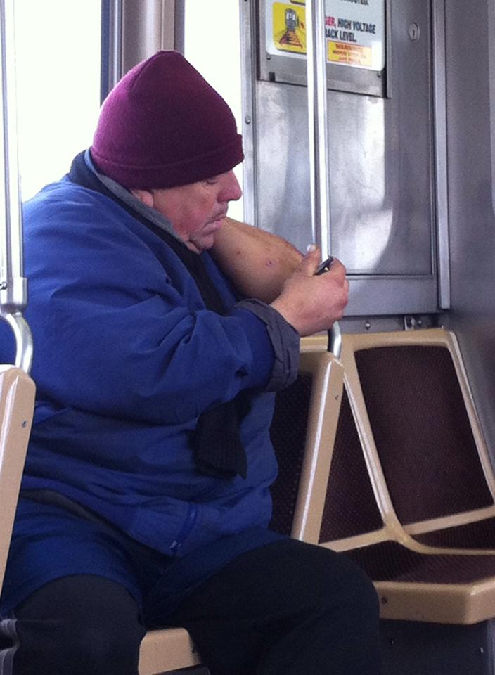Clipping off scabs with a nail clipper, then licking them