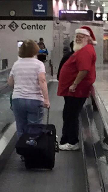 Santa on vacation outside the O’hare blue line