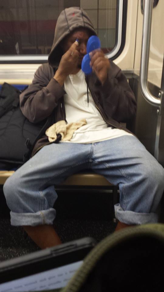 Picking scabs with a tooth cleaner on the Red line