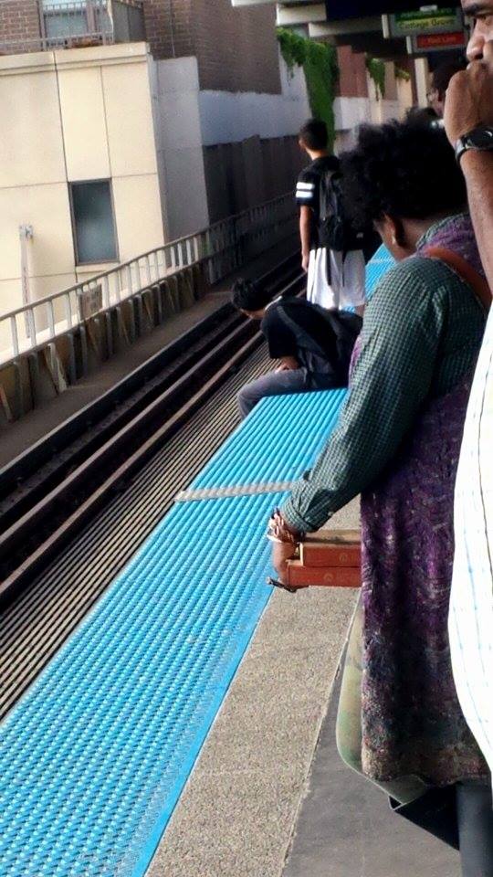 Seems like a smart place to wait for the train