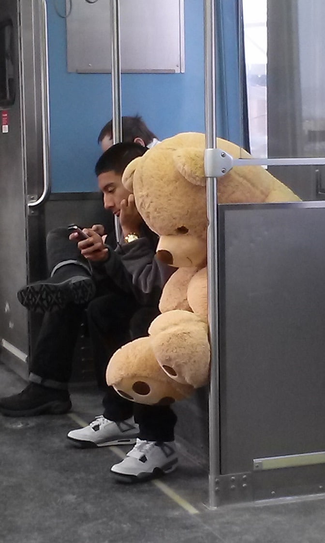 Even this giant teddy bear looks depressed riding the CTA