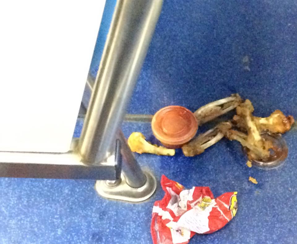 Who the f*ck eats chicken wings on the bus.  It’s a finger food and buses are dirty as hell