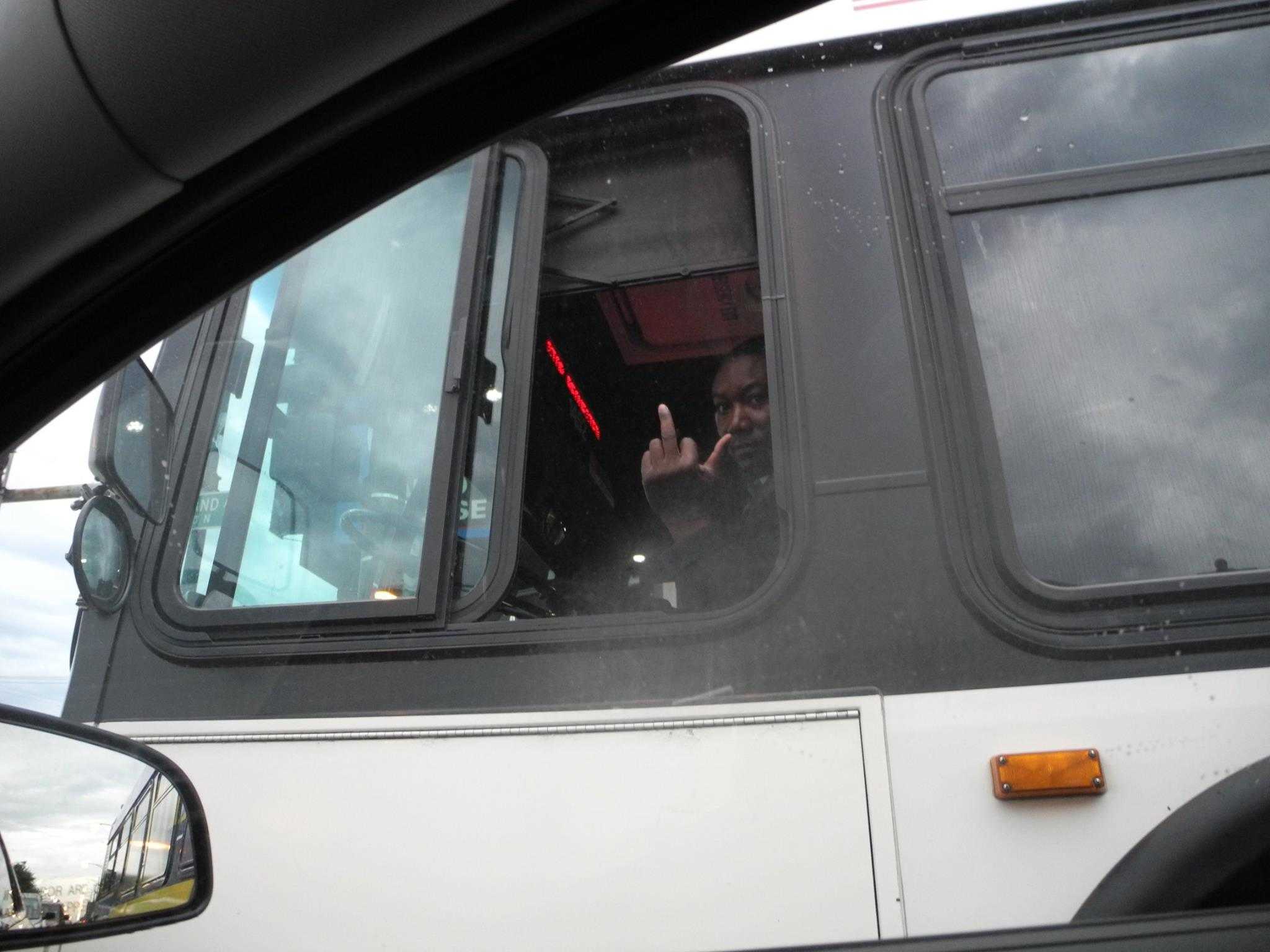 Bus driver using some sign language