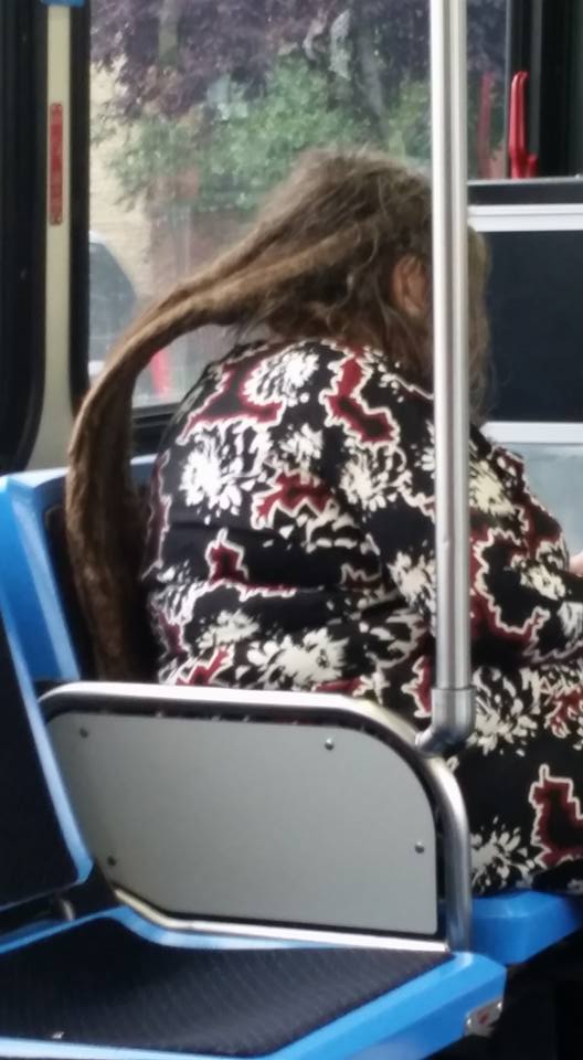Might need an extra seat for that hair!